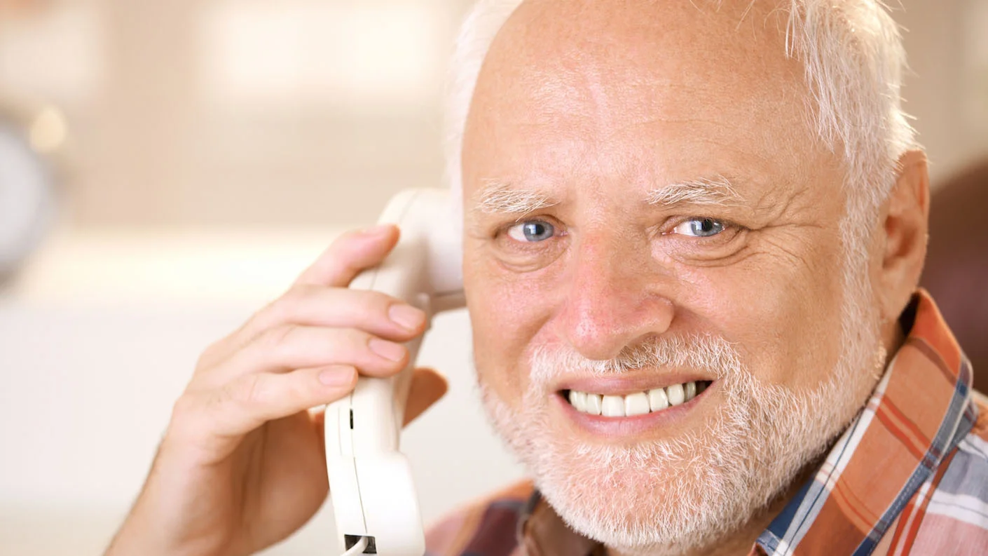 Hide the Pain Harold school stress behind a forced smile.
